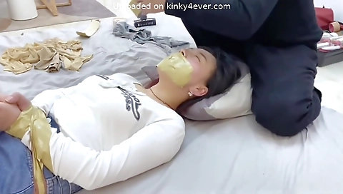 Sexy blonde in black lingerie and masturbates